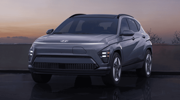 2025 hyundai kona electric parked with sunset in the back